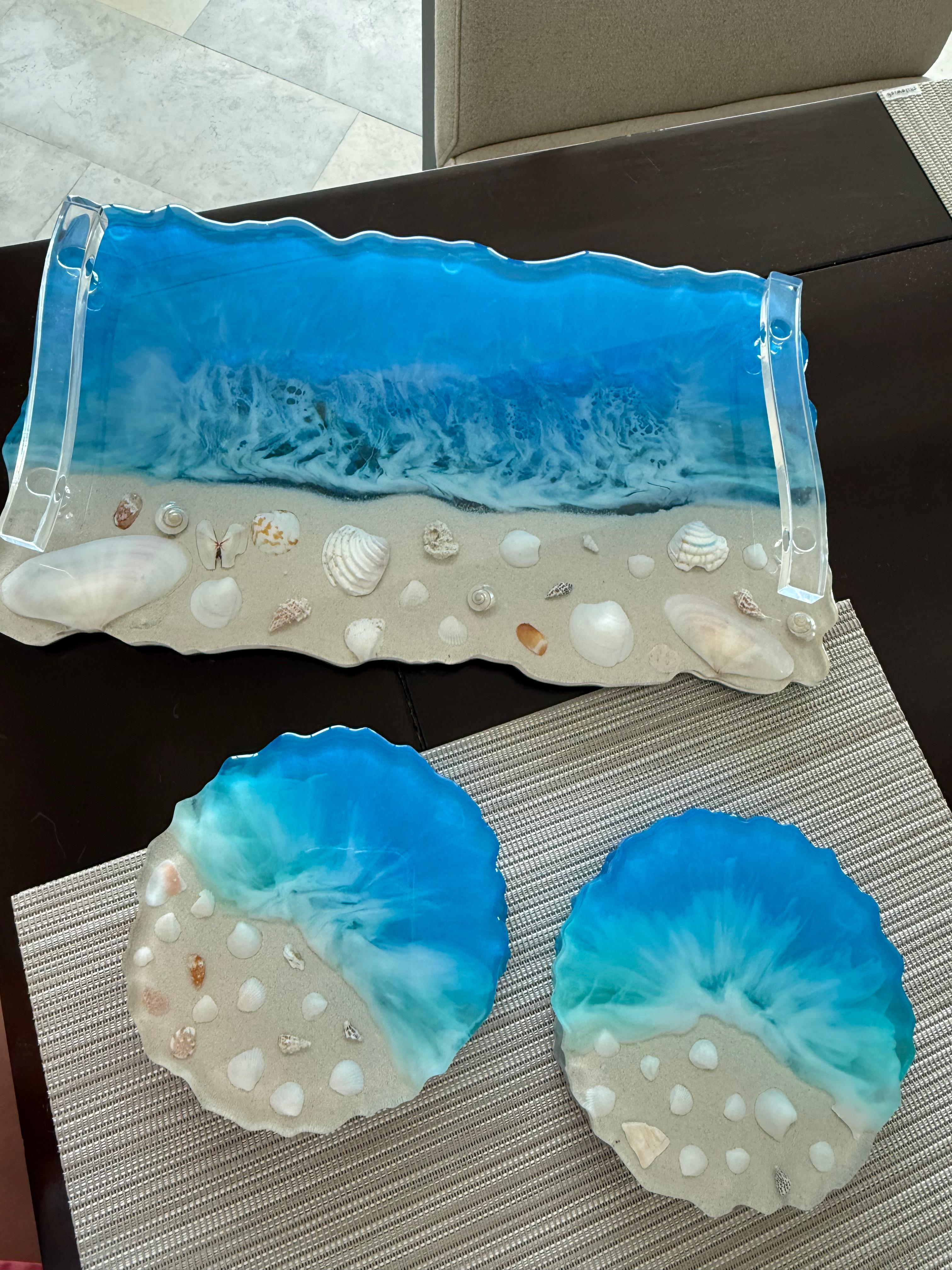 Ocean wave resin tray with sand and shells, plus matching coasters