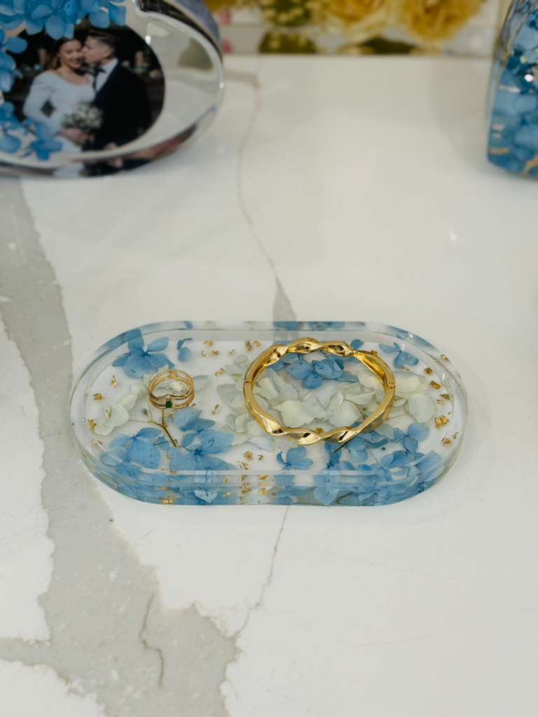 Resin oval jewelry tray with blue hydrangeas and gold flakes